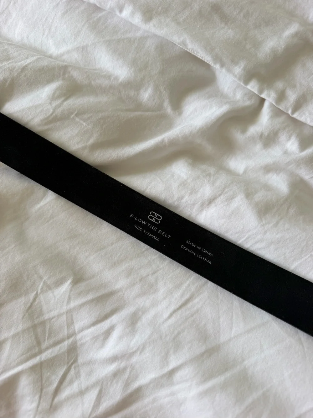 Jordana mini belt in black and silver B-low the belt